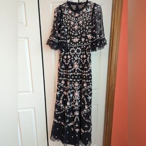 Needle and thread embroidery gown